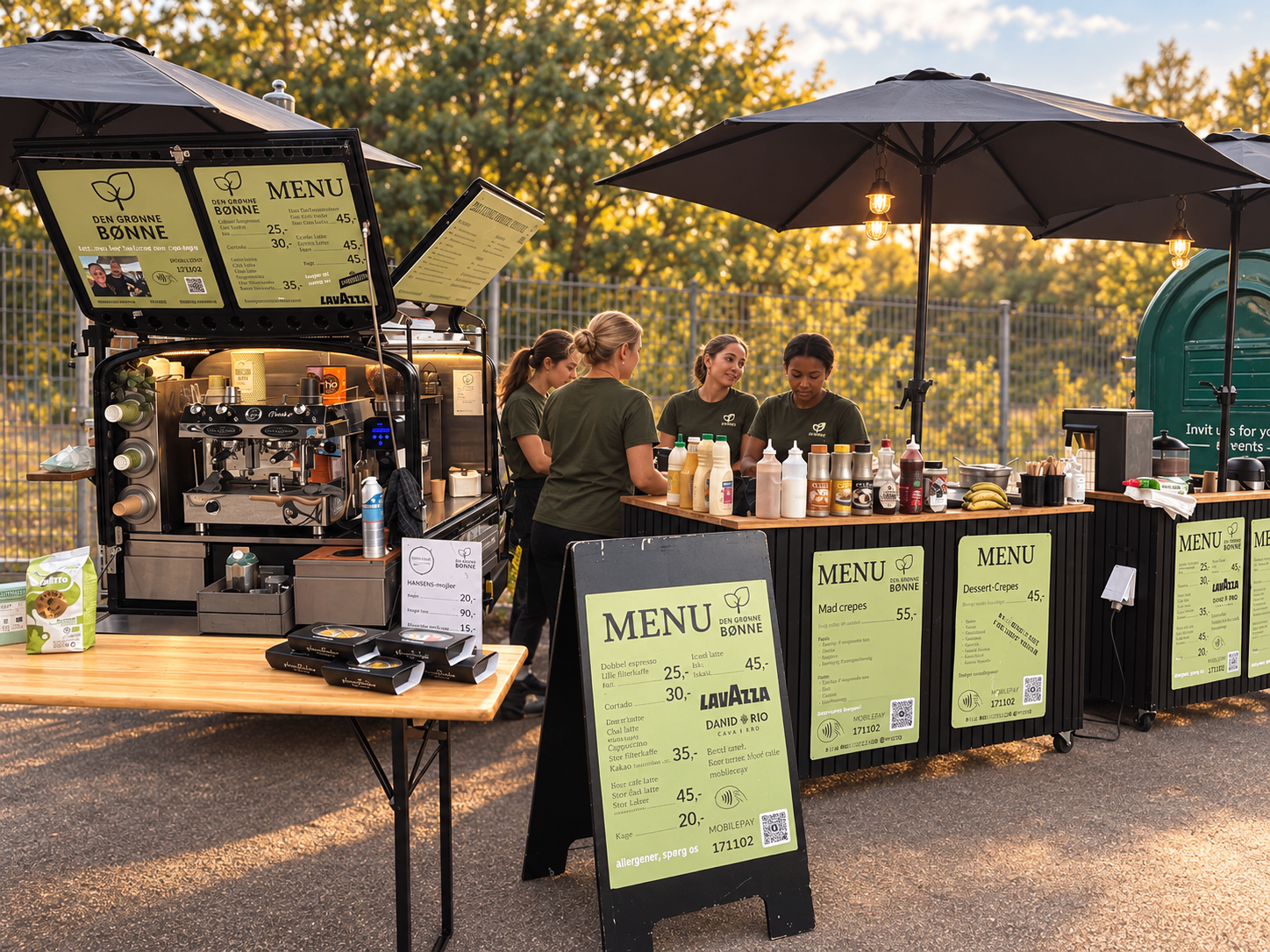 Café opsat med kaffevogn, crêpesdiske, parasoller og menuskilte